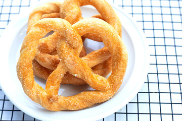 Soft pretzels on a white background.