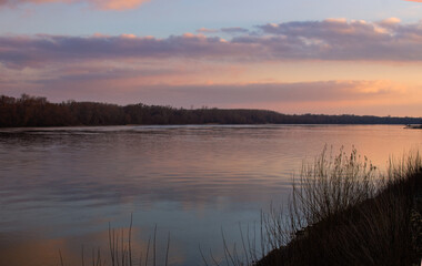 Fototapeta premium Sunrise over the river near Ecser, in Hungary.
