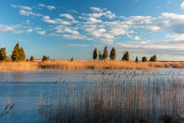 Lake landscape with blue sky and white clouds