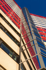 Red and white house with reflections in the windows