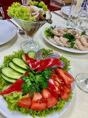 table setting with appetizers, plates, glasses