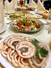 table setting with appetizers, plates, glasses