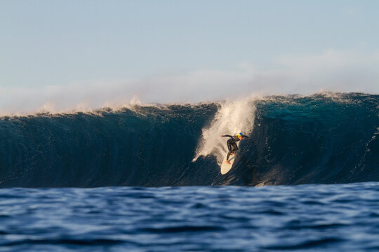 Tom Lowe, a professional big wave surfer at El Quemao wave in Lanzarote, Canary Islands. Spain.