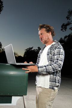 Person Getting Face Blown Back By Opening Bill At Mailbox