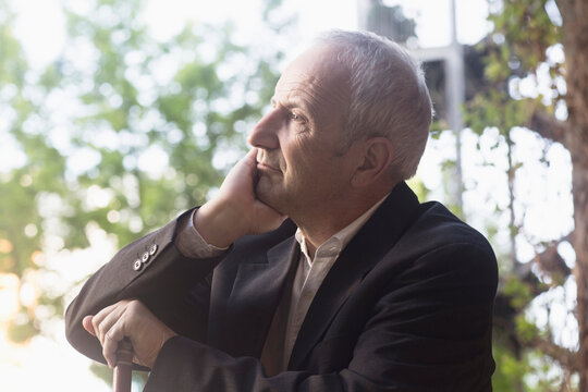 Close-up of a thoughtful senior businessman, Freiburg im Breisgau, Baden-W&uuml;rttemberg, Germany