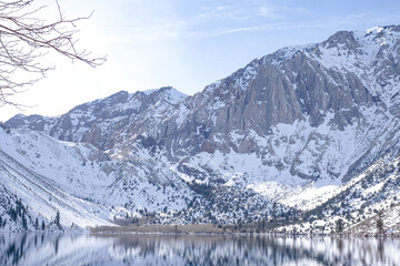 Convict lake cover snow, and a beautiful Alpine with blue sky. Beautiful nature, landscaped, and beauty in nature concept.