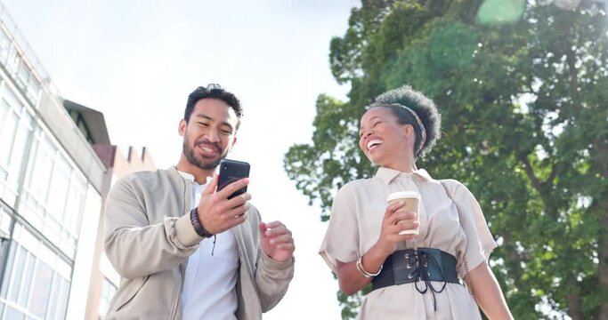 Businessman, woman and phone on outdoor walk to work with coffee, social media or comic meme. Community, business people and walking for conversation, networking or happy with excited smile in city