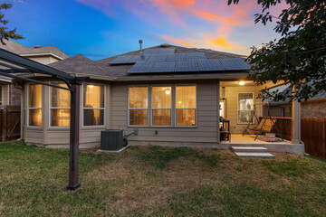house in the morning with solar panels © Allison