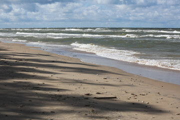 Creative beach sand with small stones
