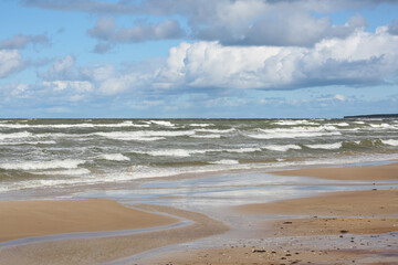 Creative beach sand with small stones
