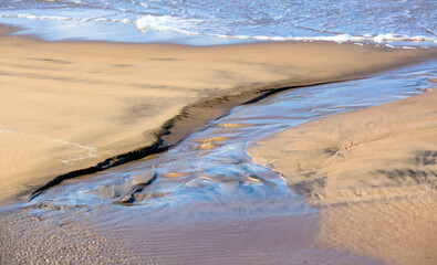 Creative beach sand with small stones