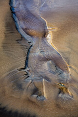Creative beach sand with small stones