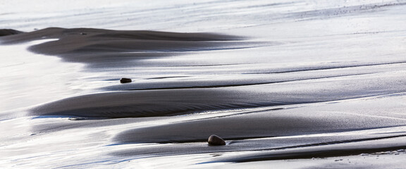 Creative beach sand with small stones