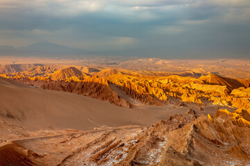 Fototapeta na wymiar Moon Valley, Valle de la Luna dramatic landscape a Sunset, Atacama Desert, Chile