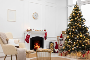 Living room interior with beautiful Christmas tree and festive decor