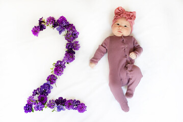 2-month-old baby girl. Baby milestone two months. Two month old baby	