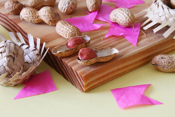 Peanut in shell. June Party Brazil. Typical food of june festival with paper flags.