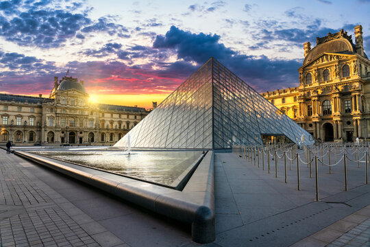 Paris Louvre Museum at sunrise. Home to Leonardo da Vinci's Mona Lisa, the Louvre is considered the world's greatest art museum