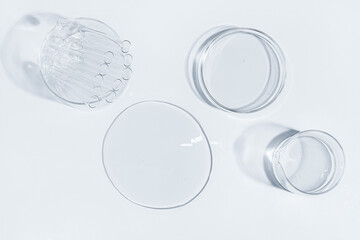 gel, flask, crystallization bowl. Laboratory. View from above. Medicine, gel texture, white, pipette, samples, research.