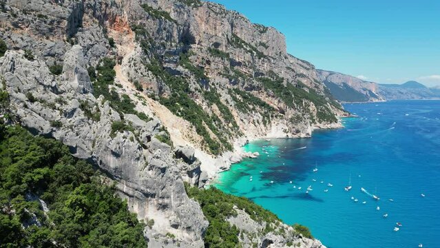 Baunei Coast and Cala Goloritze Beach Rock Formations in Sardinia, Italy - Aerial 4k