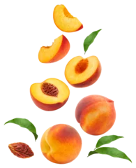 Tuinposter Levitating peach isolated. Composition of peaches, peach halves and slices with green leaves on a white background. © Денис Петровских
