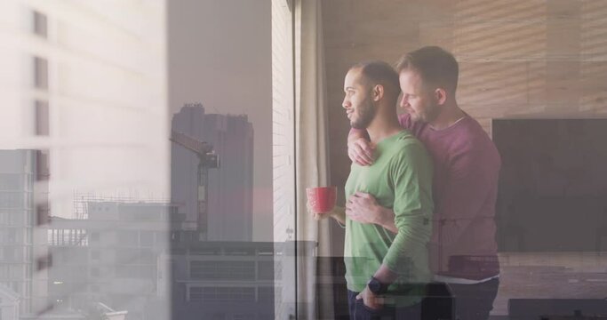 Animation of cityscape over diverse male couple embracing