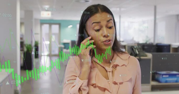 Animation of financial data processing over biracial businesswoman using smartphone