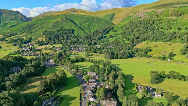 Cinematic aerial footage of the Lakeland town of Grasmere. Showing the small lakeland town. Lake District National Park, Cumbria.