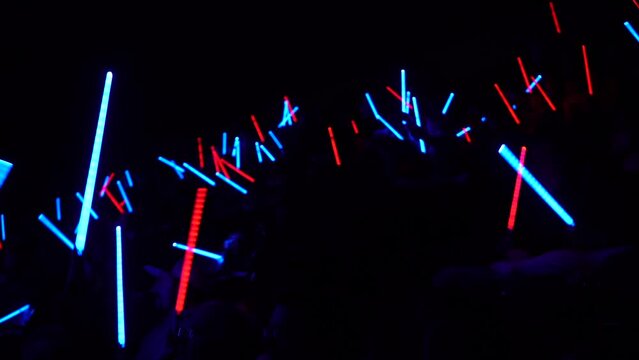 lightsabers from star wars at a basketball game