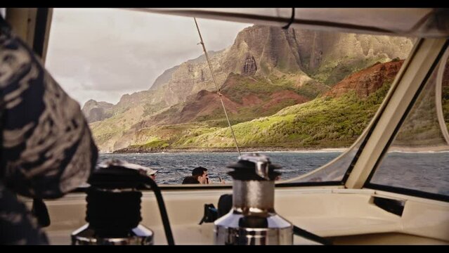 Kauai Hawaii Na Pali Coastline with sail boat in foreground