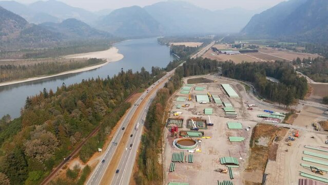 Oil and gas pipeline building. Materials to construct the TMX oil pipeline in BC. The fossil fuel industry's pipe of oil from the Alberta Oil Sands to export crude petroleum products.