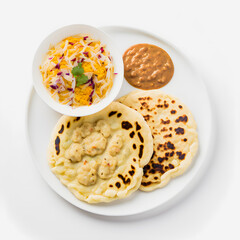 Pupusas on white background food photography. High-quality images capture the traditional flavors and textures of this beloved street food in a modern and sophisticated way. Ideal for cookbooks