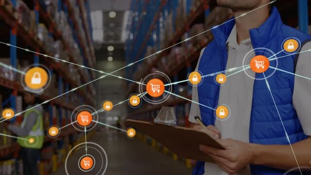 Animation of network of connections with icons over caucasian man working in warehouse