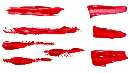 A set of red brushstrokes of various shapes on a white background.