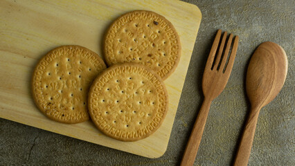 butter biscuits on wooden cutting board
