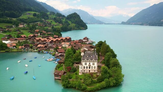 Drone Switzerland 4k. Aerial view lake Thun Brienz in Interlaken. Beautiful Swiss Alps mountains, alpine lake. Switzerland tourism in summer. 