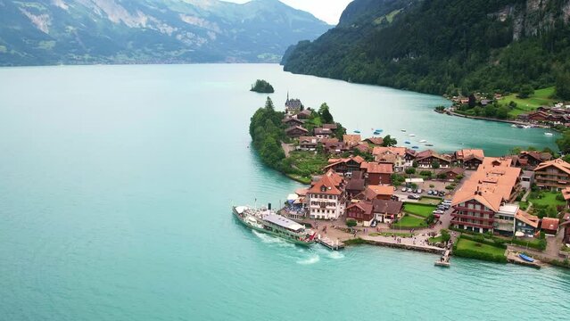 Drone Switzerland 4k. Aerial view lake Thun Brienz in Interlaken. Beautiful Swiss Alps mountains, alpine lake. Switzerland tourism in summer. 