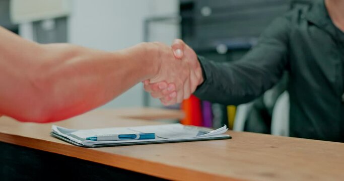 Hand, signature and gym membership with a man shaking hands with a trainer or personal coach in agreement. Finance, handshake and thank you with a male athlete signing up for training or exercise