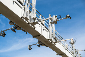 Close-up Of Security Camera On The Street. Multi-angle CCTV on pillar 360 degree system background blast cipping path operating over the road monitoring system of blue sky