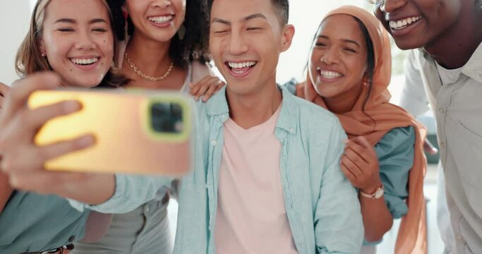 Selfie, funny face and friends with a business team posing together in the office for a picture. Social media, teamwork or emoji with a young man and woman employee group taking a photograph at work