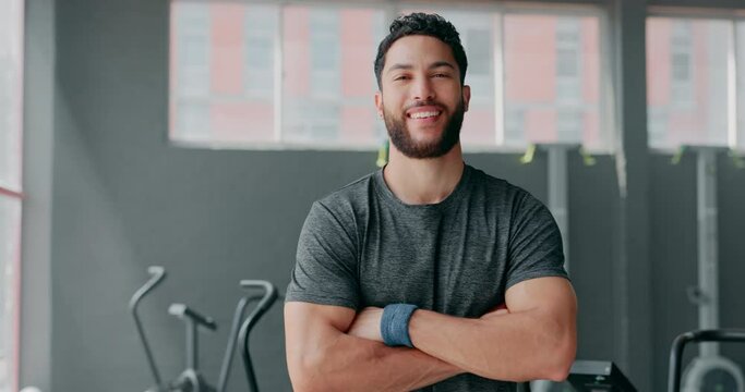 Portrait, fitness and man with arms crossed in gym ready to start workout, training or exercise. Sports, health and face of happy, proud or confident male athlete from Brazil preparing for exercising