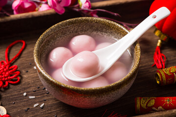 Tang Yuan(sweet dumplings balls) in a bowl. traditional cuisine food