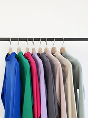 color shirts on a hanger in the store. trendy ladieswear still life