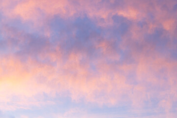 Sunset sky with pink and gray clouds