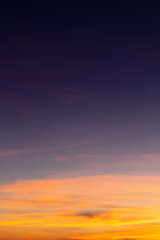 Sunset sky with pink and gray clouds