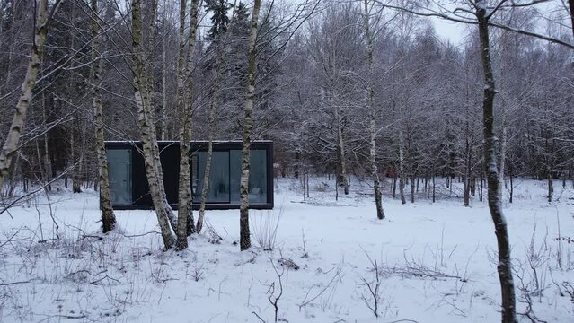 Modern mishkan conteren located in the middle of the forest