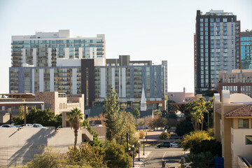 Fototapeta premium Afternoon sun shines on the urban skyline of downtown Tempe, Arizona, USA.