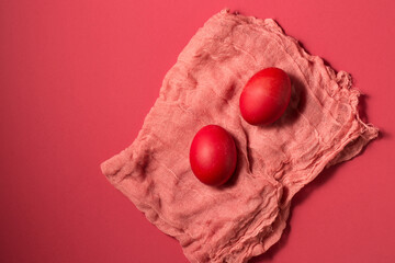 chicken eggs on pink gauze on a pink background