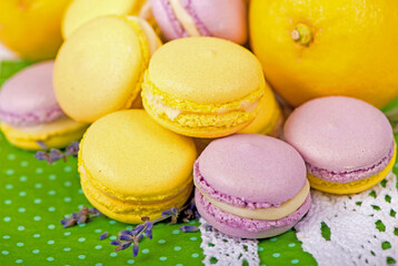 Sweet macaroons on a green napkin, vintage color tone