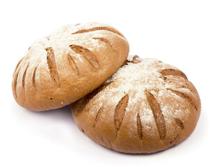 Traditional homemade round bread isolated on a white background